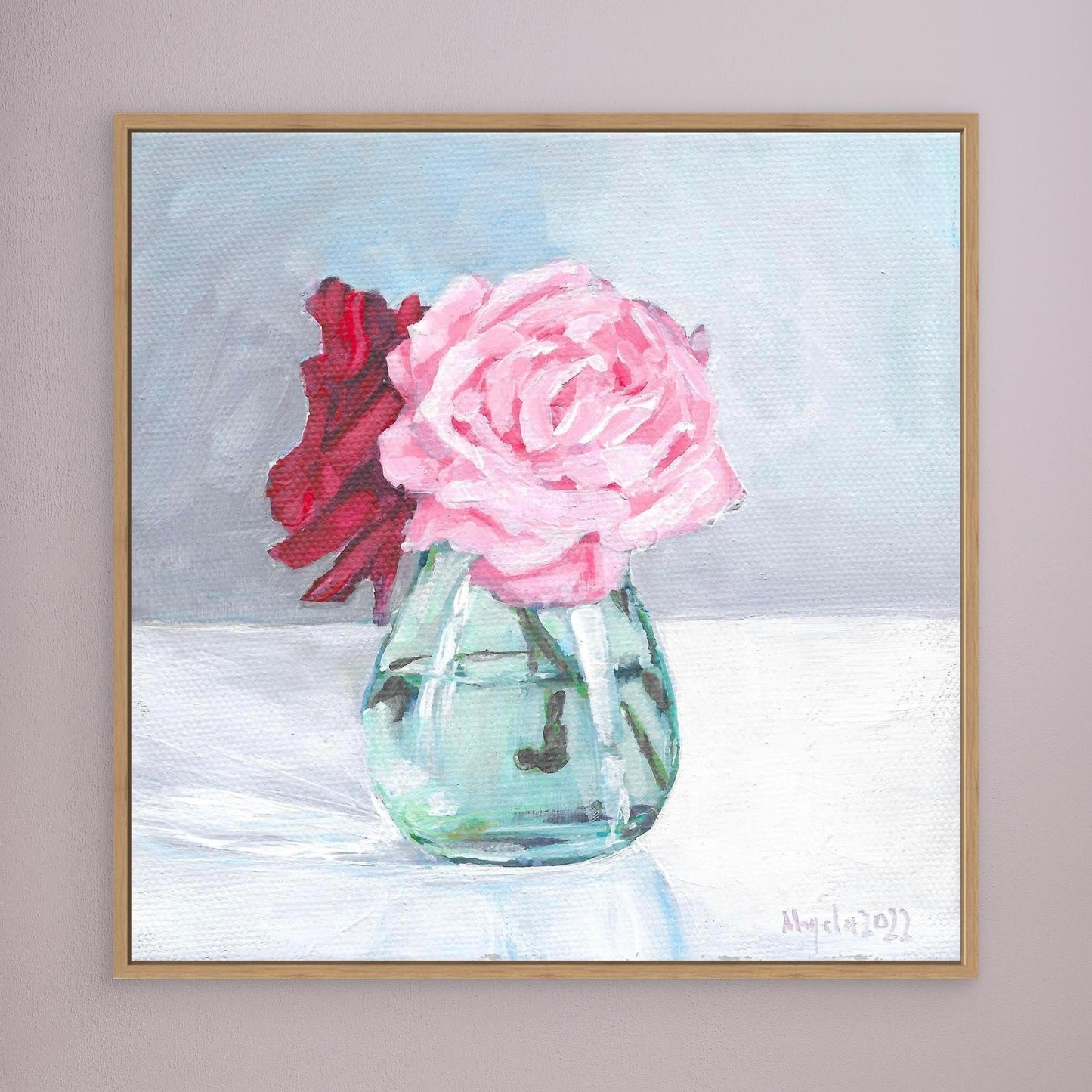 Pink and red rose in vase