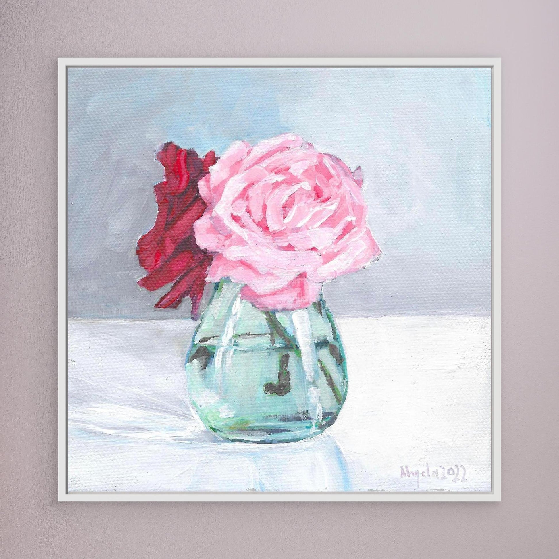 Pink and red rose in vase