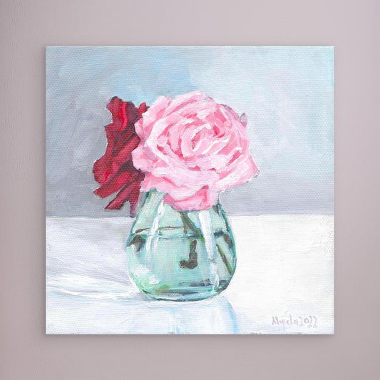 Pink and red rose in vase