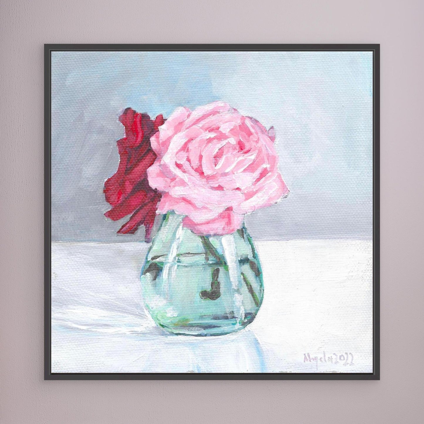 Pink and red rose in vase