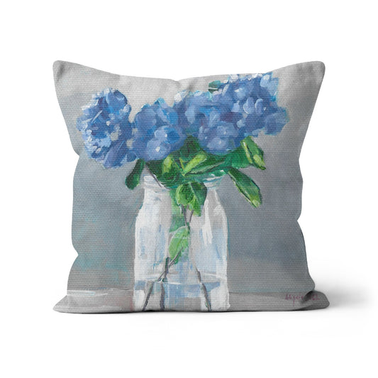 Blue hydrangea in vase Cushion